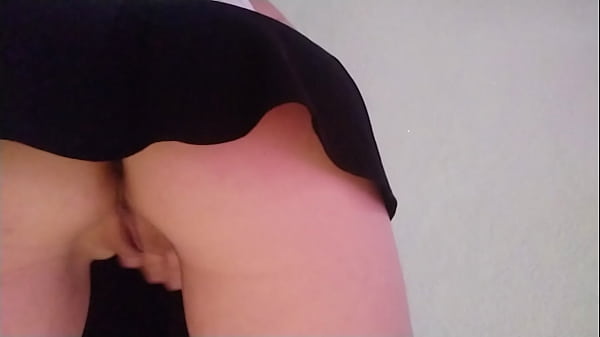 Girl in a short skirt_masturbates shaved pussy
