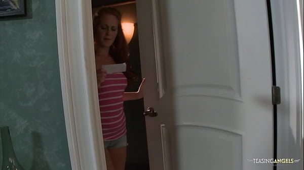 The stunning redhead model strips seductively until he gives in and slams her shaved pussy