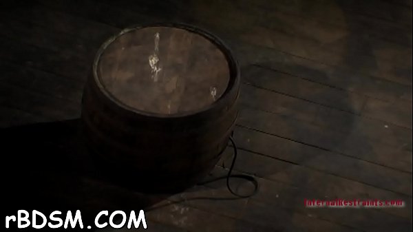 Beauty wears an metallic helmet during hardcore snatch drilling