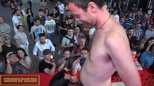 Brunette with braids fucking two big cocks