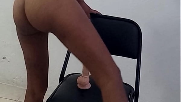 Beautiful Indian womanwith natural tits masturbates on a chair and moans likea bitch