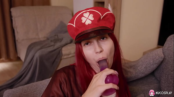 Horny redhead slut Toffina plays with a purple toy