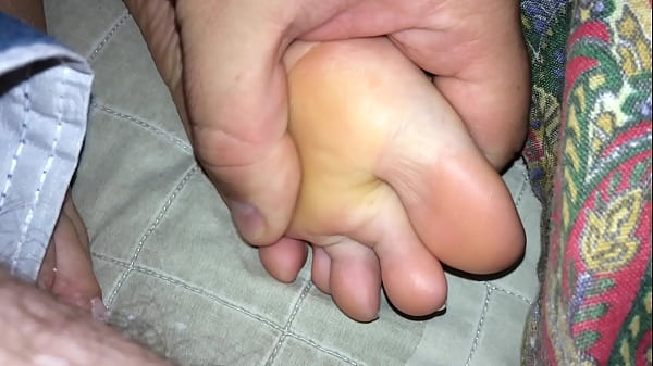 Massagingmy wifesexy juicy feetin bed