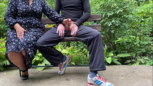 MILF stepmommilked her stepson outdoors in a condom