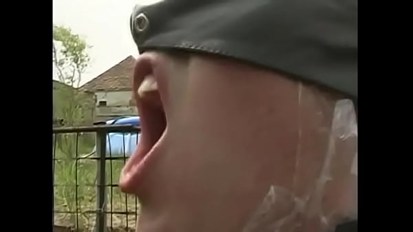 Play MP4 - Beautiful brunette in a green suit and black boots gets a dick in the yard near the house