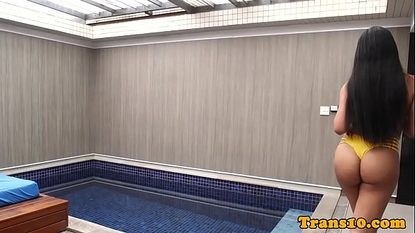 Roundass tgirl strokes her hard cock