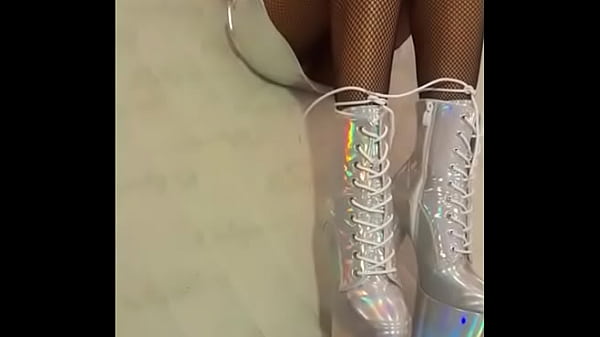 Total_silver and fishnet pantyhoseI amwearingbeautiful ankleboots with veryhigh heels silver blackfishnetpantyho