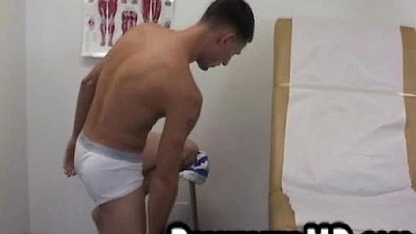 Here is a hunk doctor who is jerking his stud patients cock off 