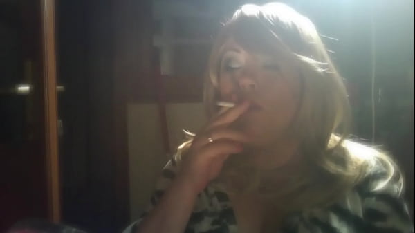 Chubby mistress smoking a cigarette with lots of drifting