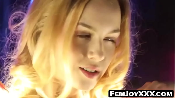 Gorgeous alecia fox teases amidst a backdrop of shimmering lights evoking a captivating allure akin to a goddess