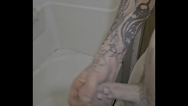 Rubing my cock in and out of the shower 