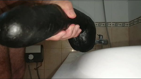 Big Dildo_insertedfull length balls and all Comments please