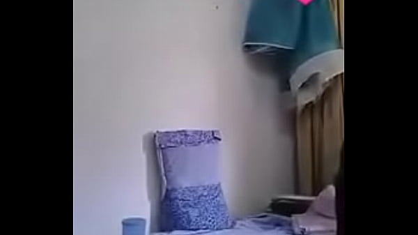 Young girl remove her dress front on webcam