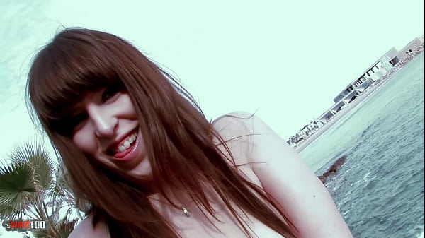 Hot brunette_Allya removing clothes in the rocks