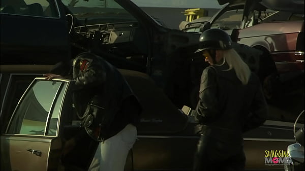 Play MP4 - Motorcycles black leather and sex at a car junkyard make the blonde milf happy