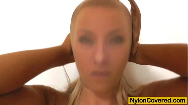 Blonde plusnylon mask on her face