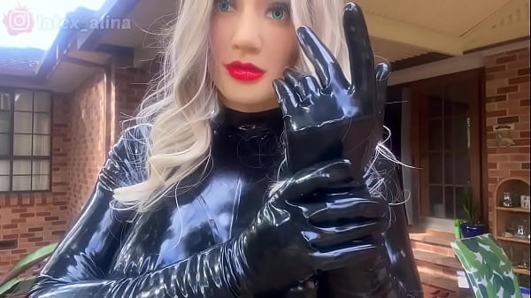 Rubber Doll in Latex Suit and Latex Gloves 