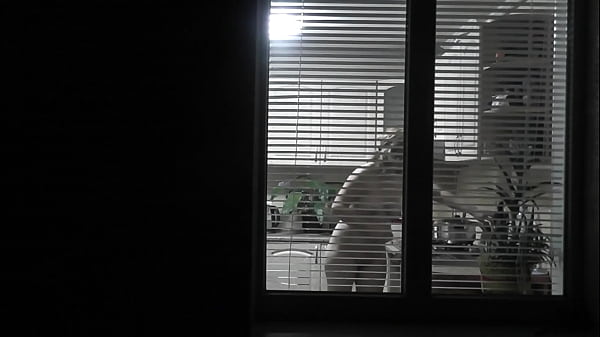 Play MP4 - Peeping&period; Voyeur&period; Neighbor pervert voyeur in evening on street looks out window as naked sexy neighbor in kitchen prepares dinner for her husband&period; Naked in public&period; Naked at home&period; Family&period;  Outdoor