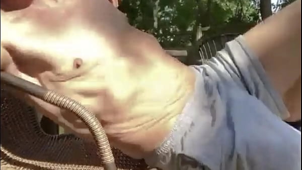 Play MP4 - Stretching and Twisting on Lawn Chair in shorts for Pain Relief