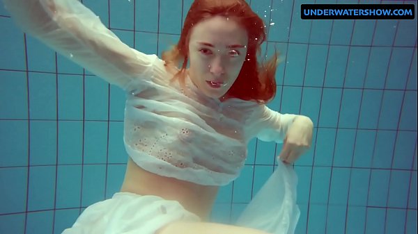 Redhead diana hot and horny in a white dress
