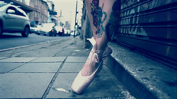 BallerinaWearingBallet_Shoes and Walking Down The Street