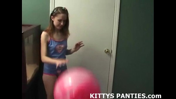 18yo Kitty playing with a puzzle in a_miniskirt