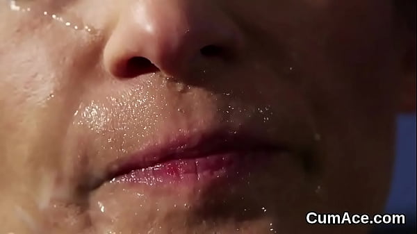 Naughty beauty gets sperm load on_her face eating allthe jizz