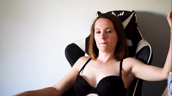 Busty brunette smoking in black bra 