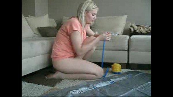 Sophie inflates_her beach mat athome then playswith her pussy