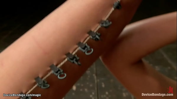 Gagged and strapped in metal device brunette slave cassandra nix latex corset gets pussy vibrated till squirts then zippered leg on the ground caned by milf mz berlin and claire adams