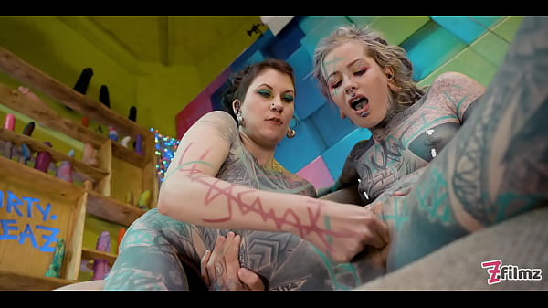 Inked up guy threesome alternative babes share his dick 