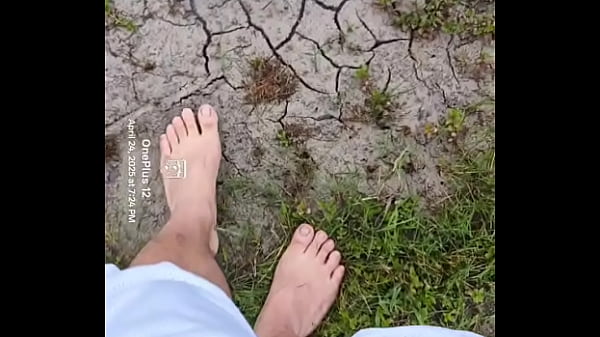 Bare feet playing in the mud