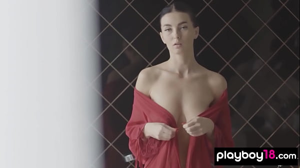 Busty all natural brunette beauty teasing in the bath 