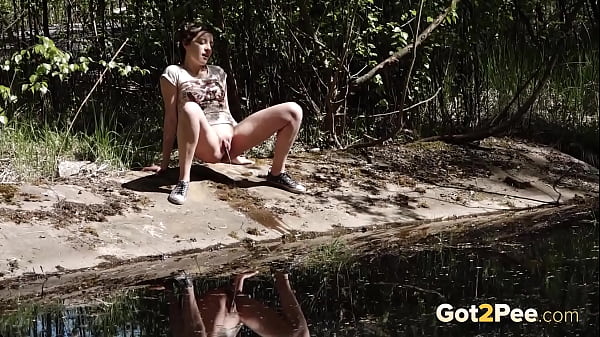 Got2pee Brings Another Desperately Peeing Girl In Basking In The Sun - Featuring Big Puddle thumbnail