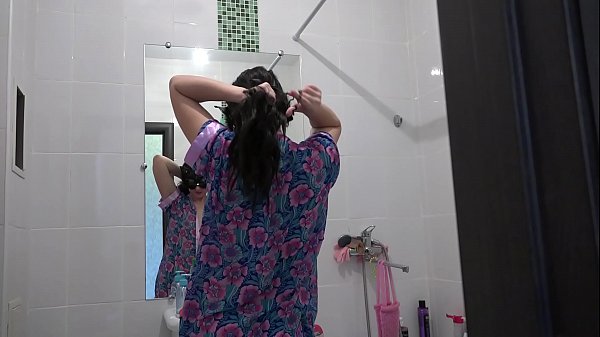 A girl with a sexy butt takes a shower and plays with water and fucks with a sex toy. 