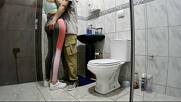 Mistress getting intimate in the bathroom after a workout.