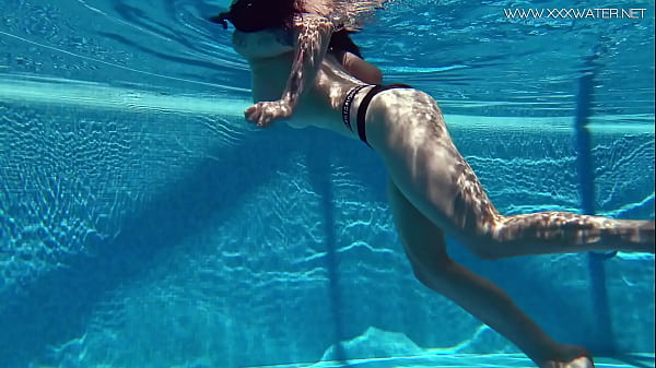 Sheril Blossom gets horny_and naked in the pool