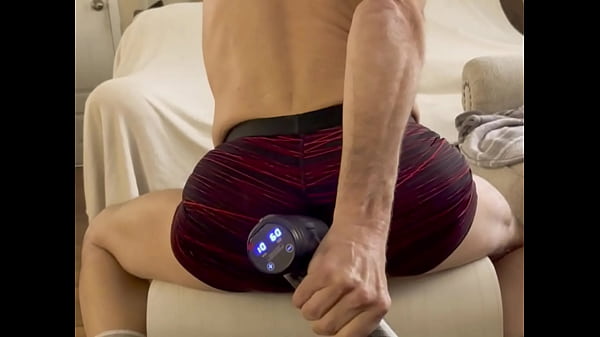 Fun clips from full video stretching on the coffee table with tight short shorts and a pecussion massager 