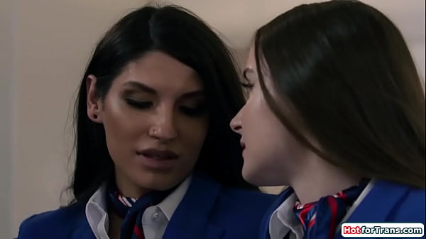 Shemale flight attendant Zariah Aura and her female colleague Hazel Moore are finally alone.The busty babe kisses and deepthroats the tgirls big cock 