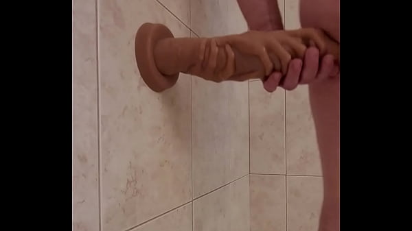 two hands and_a cock dildo standing