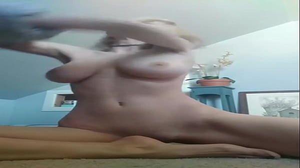 Girl with big jiggly boobs taking her shirt off