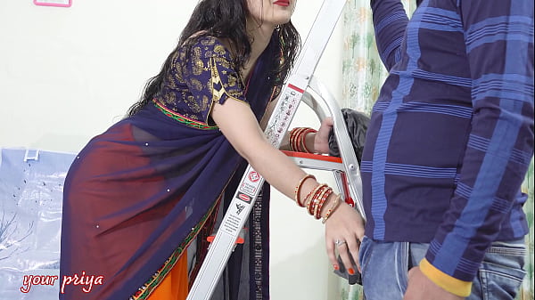 Young Indian Girl Desi Bhabhi Cleaning Fans On Stairs, In Front Of Devar Ji thumbnail