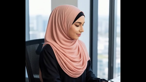 Hijab wearing muslim girl at work 