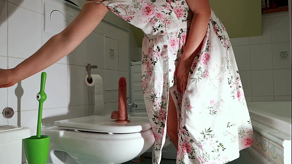 Hot mommy hides and fucks big dildo in toilet