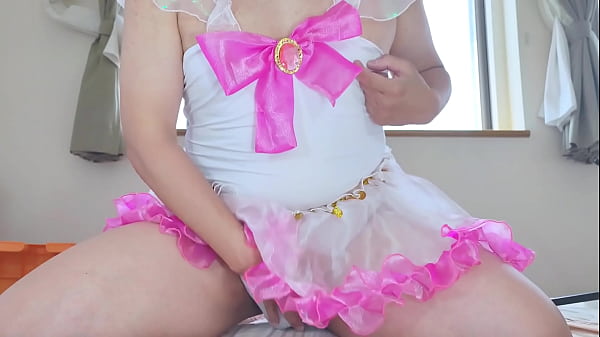 Sissy Kotchan is cross-dressed in a pink costume, indulged in anal masturbation, making naughty sounds. 