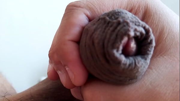 Slowly stroking my uncut cock, closeup. May 24, 2024.