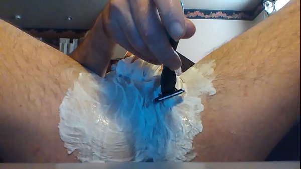 Shaving while watching self through VR 