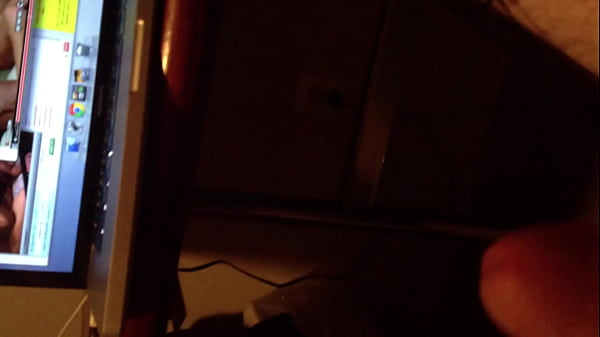 Gay dude stroking cock to porn