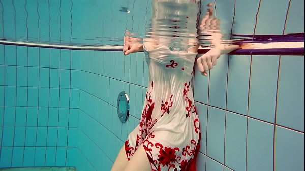 Polish babe Marketa gets wet in the pool 