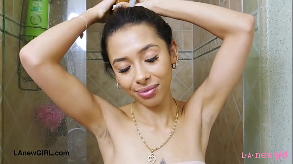 Elegant teen model enjoys a sensual bath